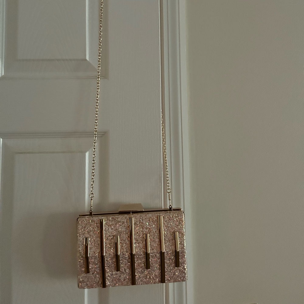 Women’s Clutch. Gold/multi colored.